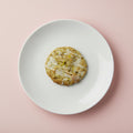 Limón Real:      Galleta de vainilla con chispas de chocolate blanco, relleno de cheesecake al limón, glaseadas.
